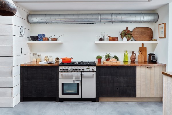 RS16291_Falcon Professional Deluxe 90 Dual Fuel in Stainless Steel with chrome trim in industrial style kitchen with dark and light wood cabinets-original.jpg